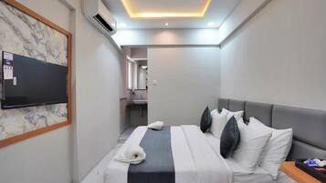 Deluxe Double Room, Patio, City View | Desk, laptop workspace, free WiFi