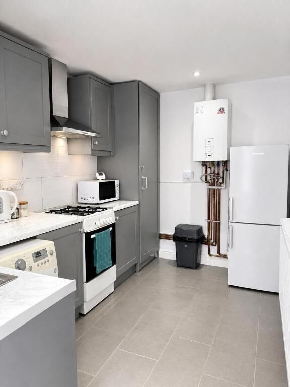 Familienapartment, Mehrere Betten, eigenes Bad, Gartenblick | Eigene Küche