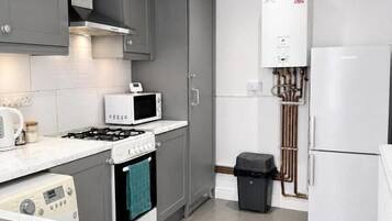 Familienapartment, Mehrere Betten, eigenes Bad, Gartenblick | Eigene Küche