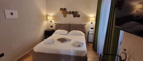 Cortinas blackout, tabla de planchar con plancha y wifi gratis