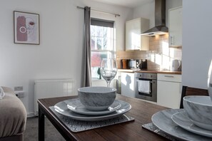 Fridge, microwave, oven, stovetop - Contractor Room • Kitchen • Central Spot (Neath Port Talbot Principle Area)