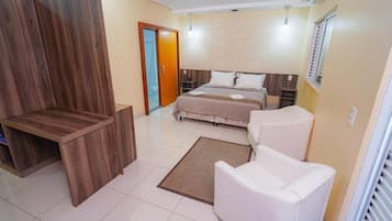 Deluxe Suite, Balcony, City View | In-room safe, free WiFi