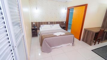 Suite Deluxe, balcón, vista a la ciudad | Caja de seguridad en la habitación y wifi gratis
