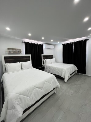 Apartamento luxo, vista para o oceano | Ferros/tábuas de passar roupa, Wi-Fi de cortesia