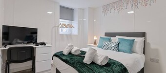 2 Bed • 2 En-Suites • Kitchen • Contractor Base