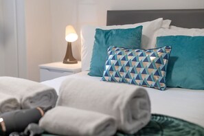Iron/ironing board, travel crib, WiFi, bed sheets