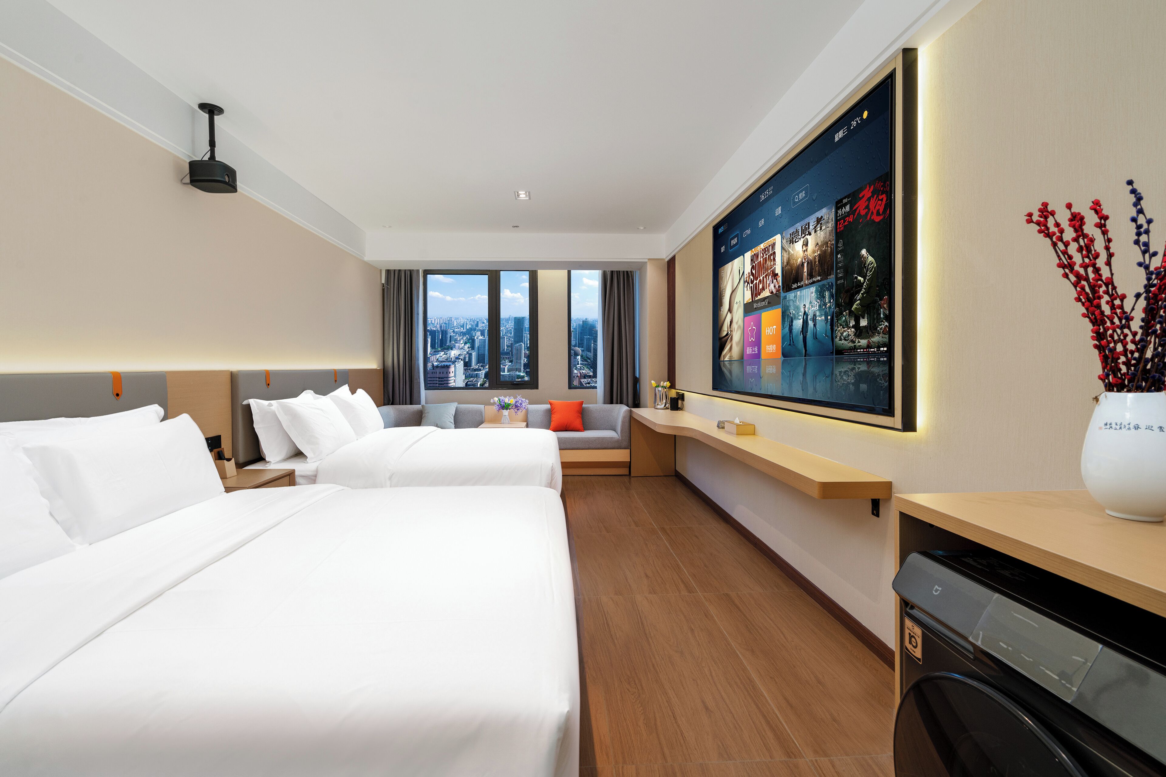 Down duvets, memory-foam beds, desk, laptop workspace