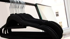 A black hanger on a metal rack. - NEW! Charming 2BR Home in a Popular Urban Quarter (Cardiff)