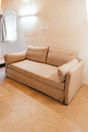 Comfort-værelse til 4 personer - udsigt til have | Opholdsområde