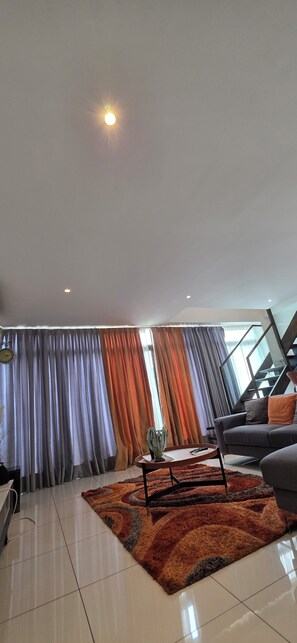 Comfort Duplex, Balcony | Living area - EBS Properties At Embassy Garden (Accra)