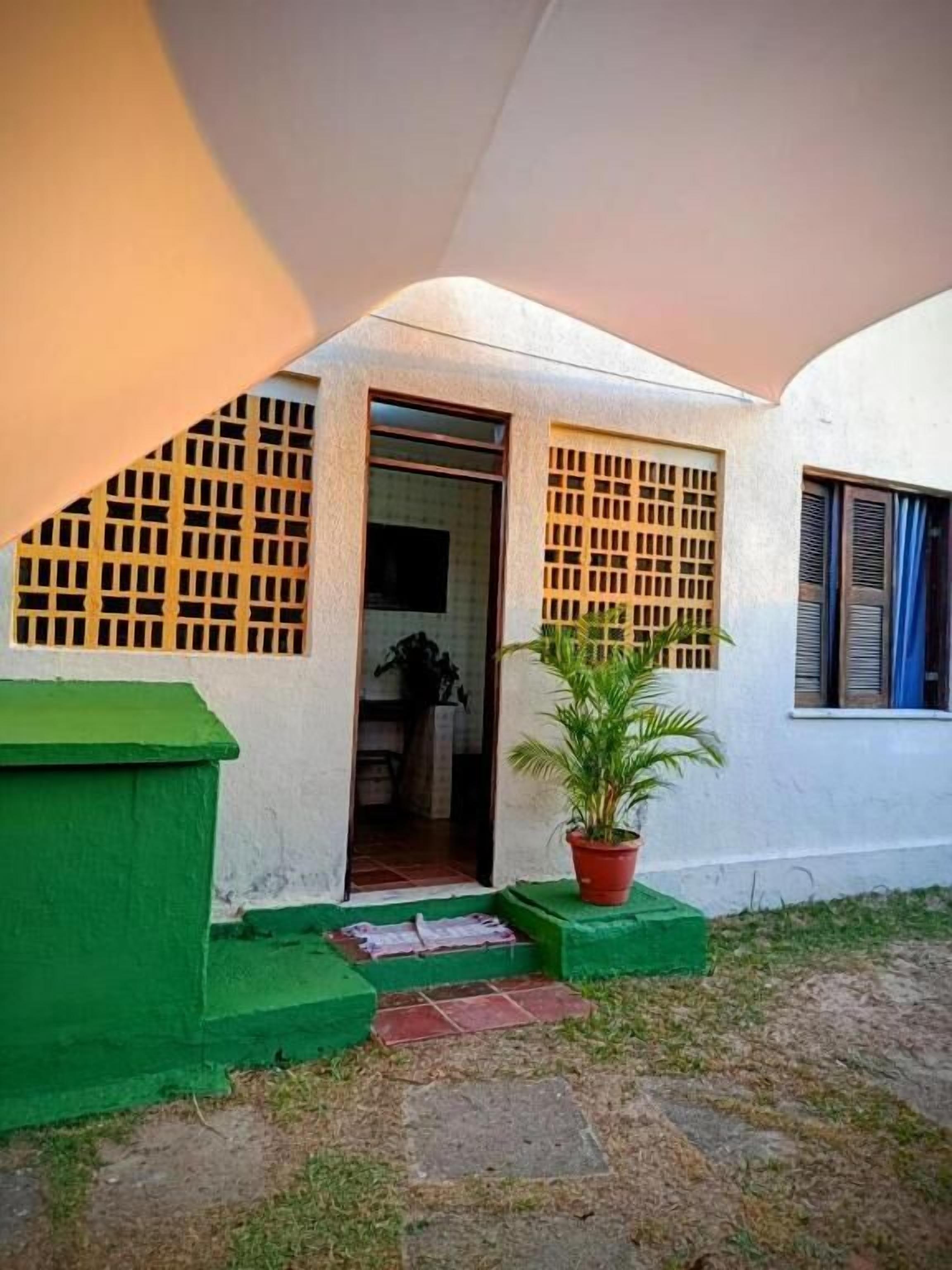 SUITE JASMIM | Detalhe da fachada