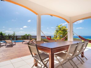 Outdoor dining - Villa O'Bed, breathtaking sea view and private pool for 6 guests (Grand-Bourg)