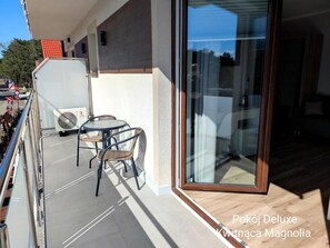 Deluxe Double Room, Balcony, City View | Outdoor dining