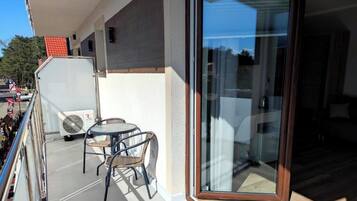 Deluxe Double Room, Balcony, City View | Outdoor dining