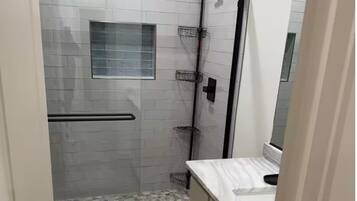 Shower, towels, soap, shampoo