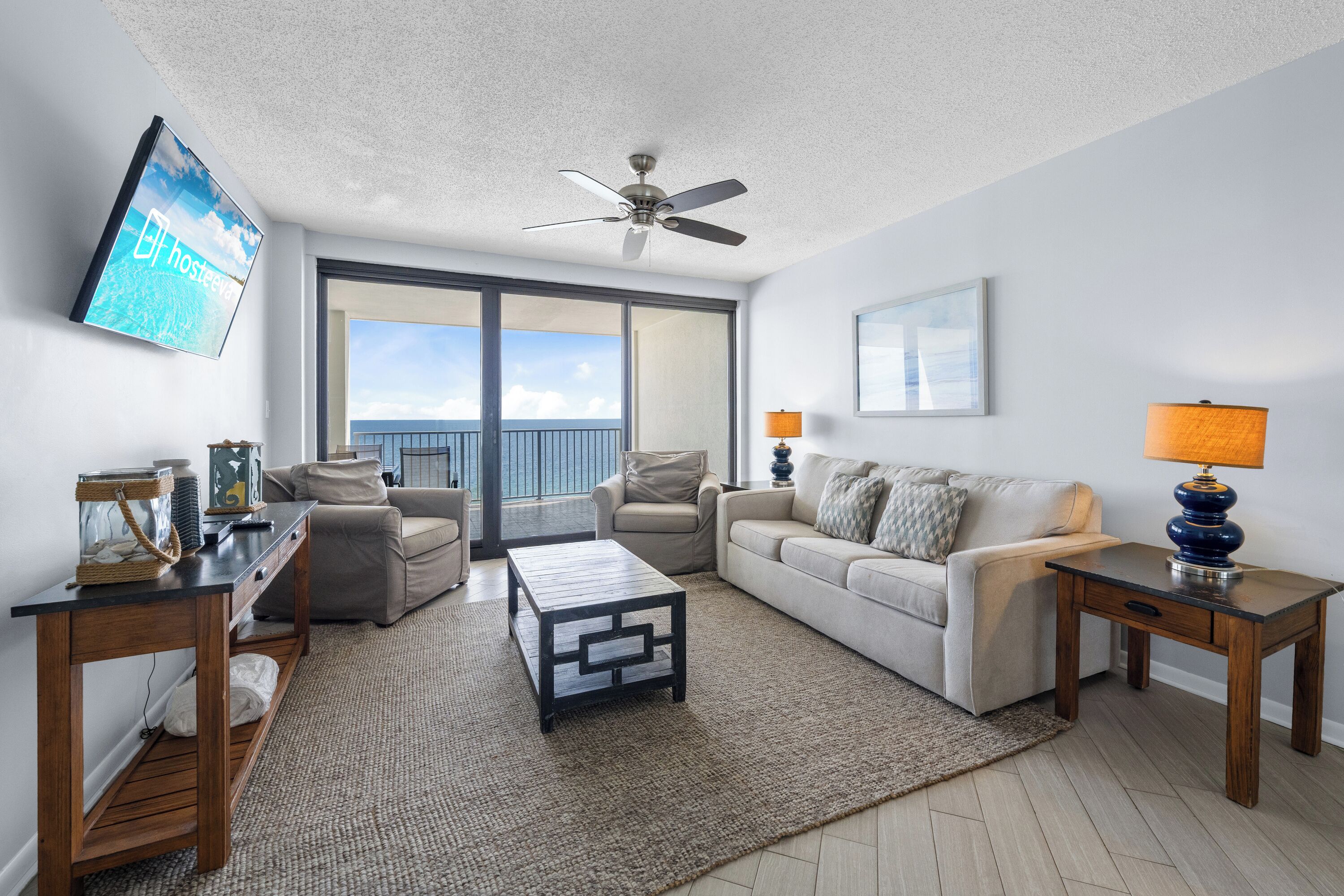 Signature Condo, 3 Bedrooms, Balcony, Beach View | Living room | 32-inch Smart TV with satellite channels