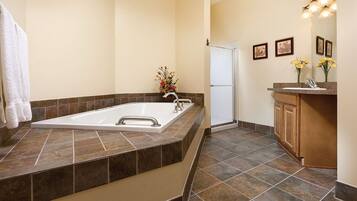 Shower, hair dryer, towels, shampoo