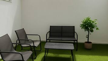 Doppelzimmer, Gartenblick | Terrasse/Patio