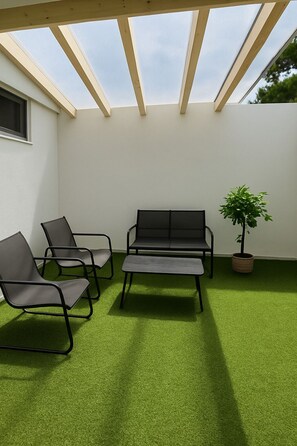 Doppelzimmer, Gartenblick | Terrasse/Patio