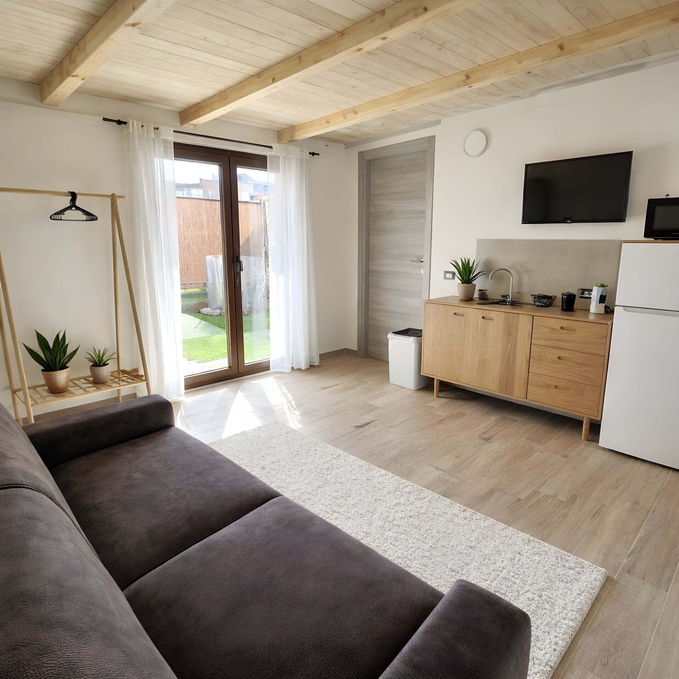 Appartamento, vista giardino | Area soggiorno