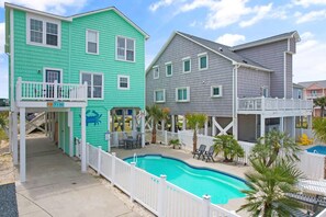 A heated pool - Oceanview Key Rest on Oak Island: Spacious 6BR, 5BA home for 15 guests with pool. (Oak Island)