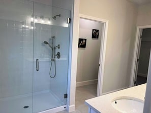 Shower, towels, soap, toilet paper