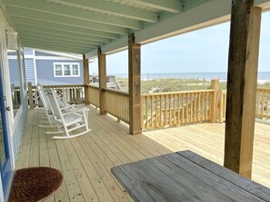 Terrace/patio - Experience oceanfront luxury at The Blue Fiddler in Oak Island, perfect for 10 guests! (Oak Island)