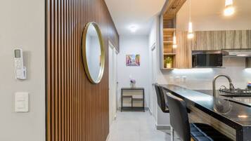 Fridge, microwave, stovetop, coffee/tea maker