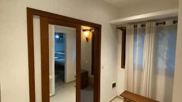 Deluxe Quadruple Room, Balcony, Garden View | Interior