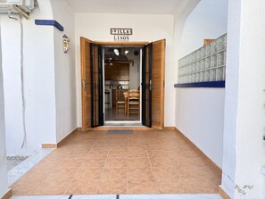 A hallway leading to a room with a sign reading 'Villa Lison.' - Villa Lison By Gloove (La Mata)
