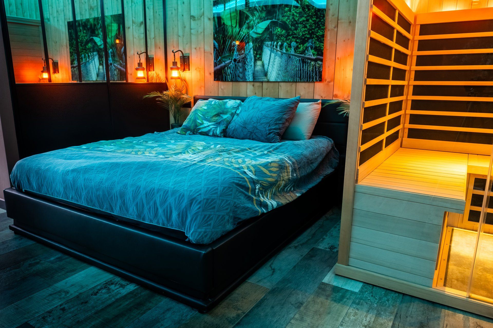 A bedroom with a bed, a nightstand, and a wall-mounted shelf.