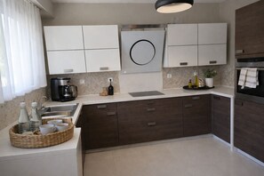 Microwave, oven, stovetop, dishwasher - 3-bedroom villa in serene Rhodes with cool AC breeze (Rhodes)