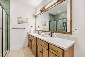 Shower, hair dryer, towels, shampoo