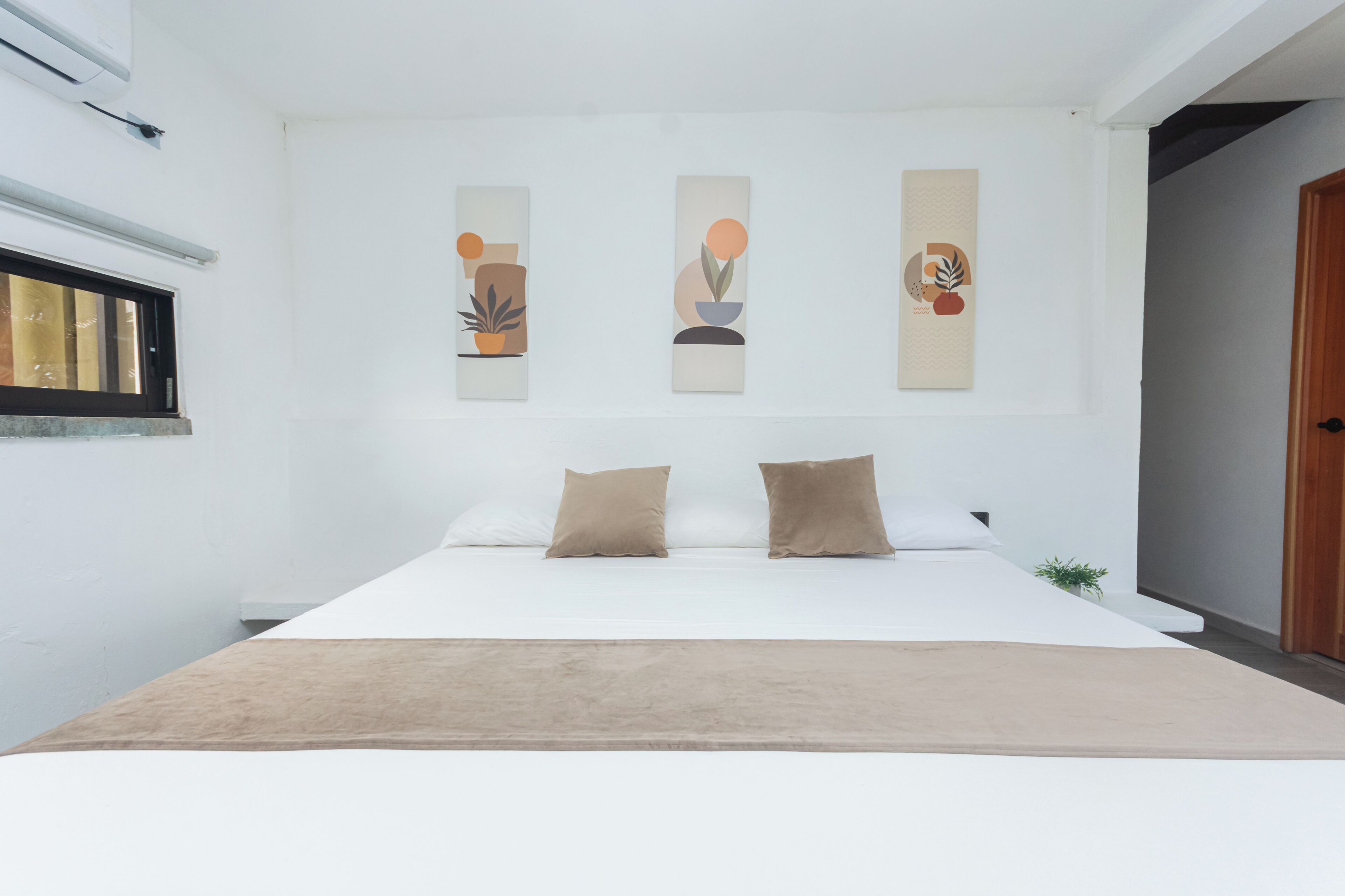 Quarto casal standard, vista para o jardim