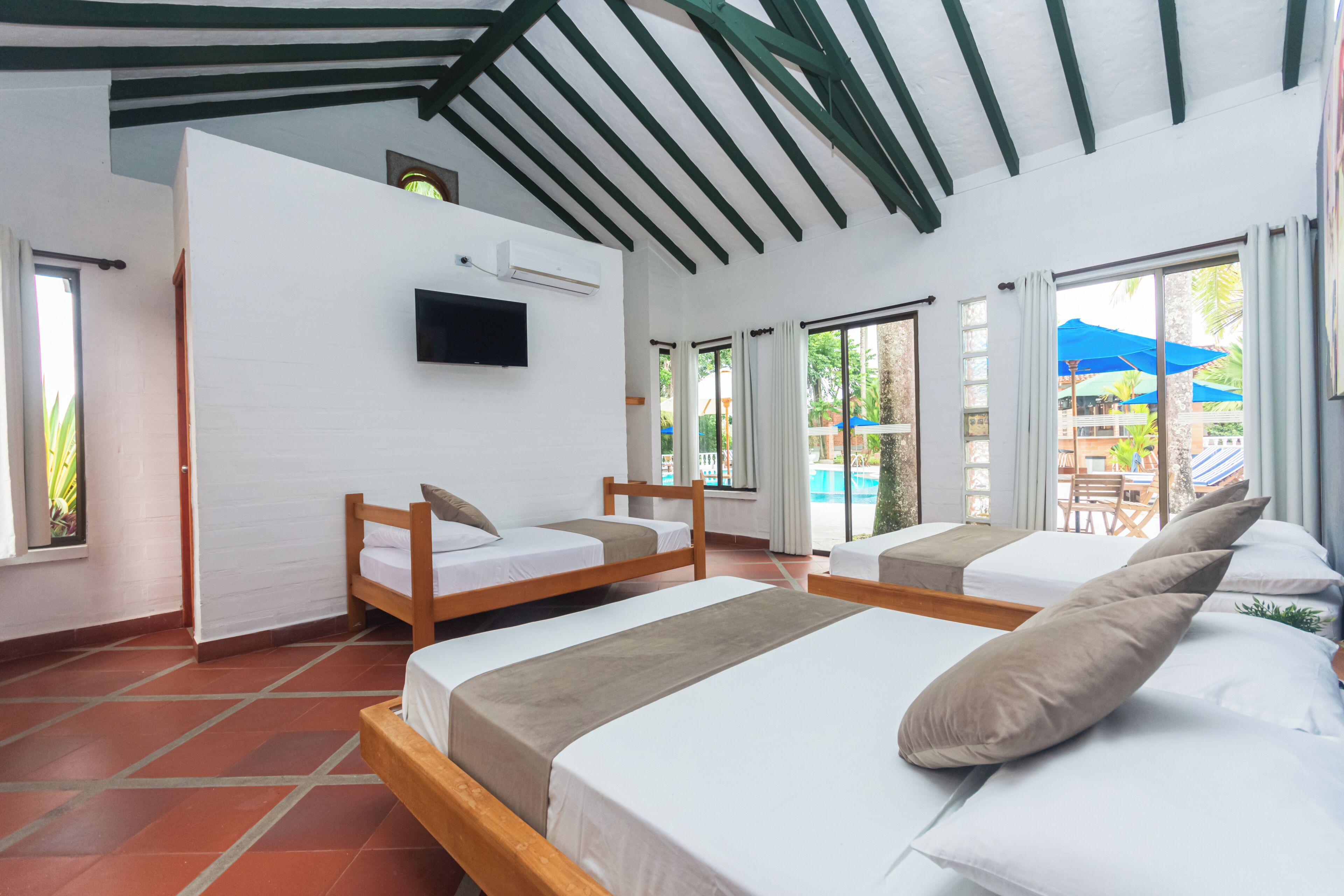 Family Room, Multiple Beds, Air conditioning, Garden View | Free WiFi