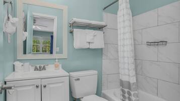 Hair dryer, towels, soap, toilet paper