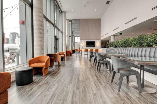 Stylish Downtown Suite with Patio & City Views