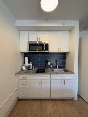 Fridge, microwave, coffee/tea maker, cookware/dishes/utensils - [13] ATX Studio: 2 Twins, Access to Gym & Laundry (Austin)