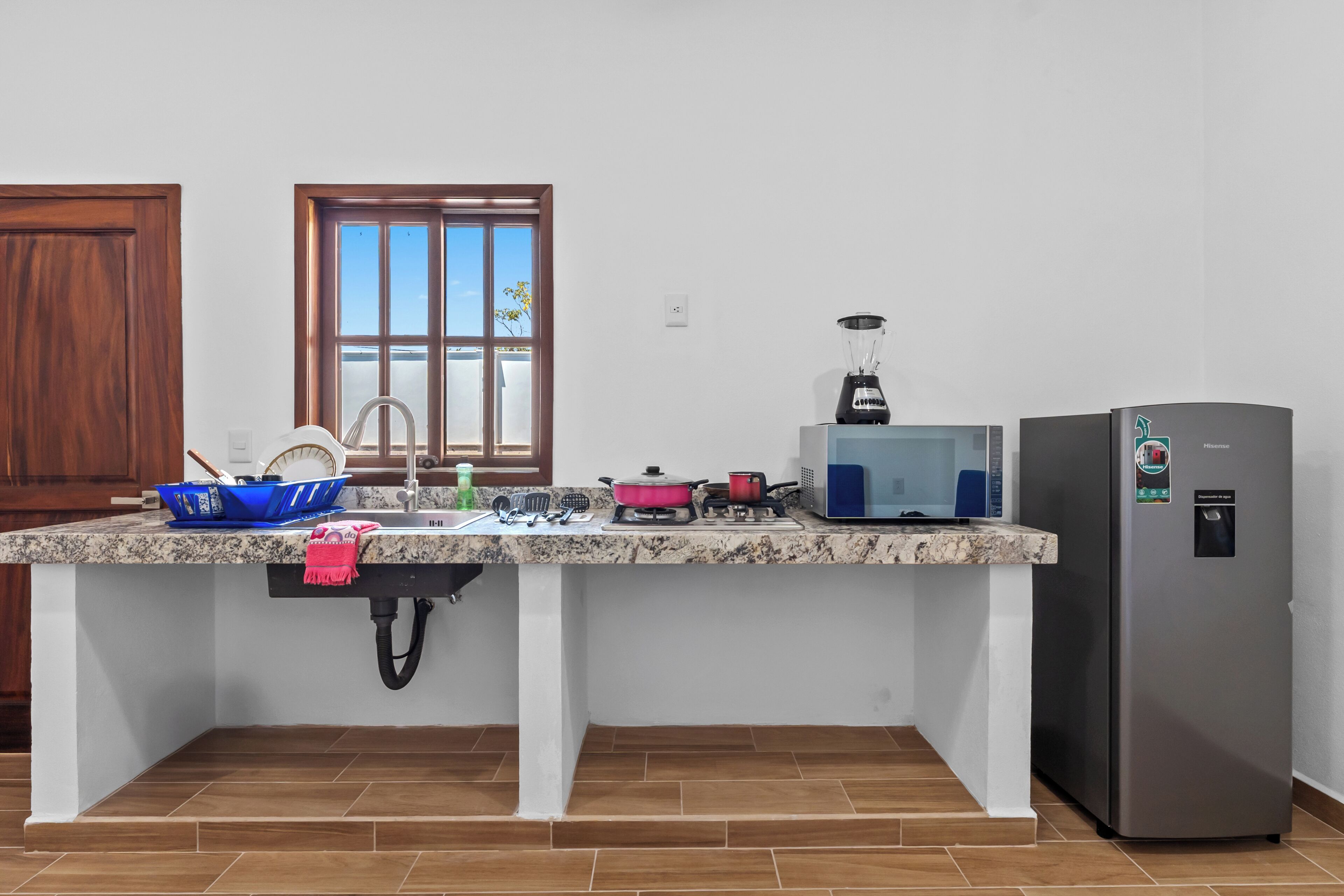 Habitación doble clásica, vista a la alberca | Cocina privada