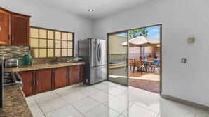 Grand Villa | Private kitchen | Coffee/tea maker, fridge, microwave, stovetop - Casa Nacho Hotel by Monyxbnb (Puerto Vallarta)