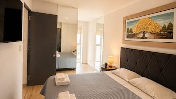 2 habitaciones, tabla de planchar con plancha, internet y ropa de cama