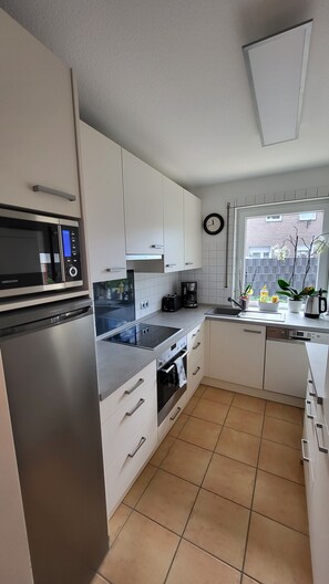 Private kitchen - High-quality, cozy vacation apartment on the first floor - two bedrooms - (Greven)
