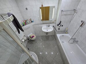 Hair dryer, towels, soap, shampoo