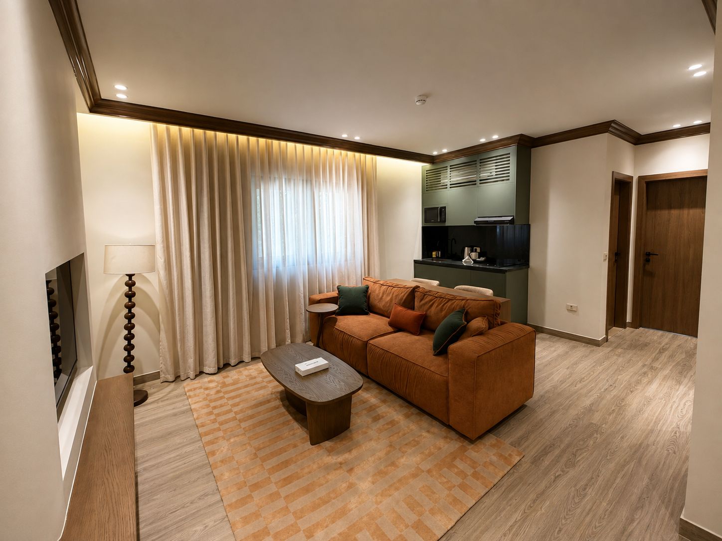 Deluxe-Apartment | Wohnbereich | 55-Zoll-LED-Fernseher mit Kabelempfang, Drucker