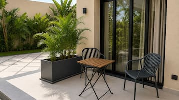 Superior Apartment, 1 King Bed, Mobility Accessible, Garden View | Living area | 55-inch LED TV with cable channels, printers