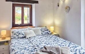 2 habitaciones, tabla de planchar con plancha y cuna de viaje 