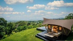 Habitación doble Deluxe, vista a la montaña | Terraza o patio