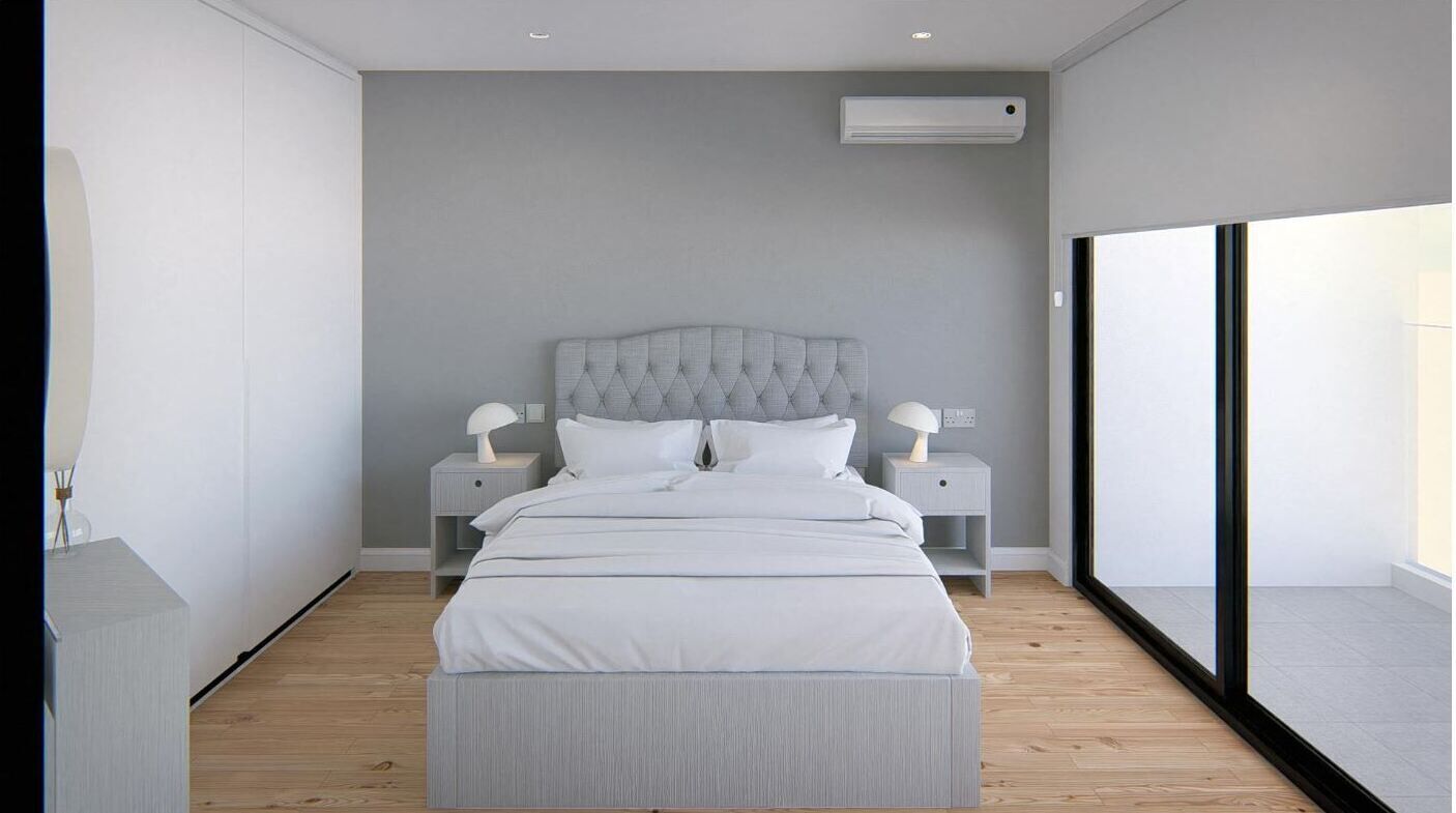 A modern bedroom with a tufted headboard, a large window, and a wooden floor.