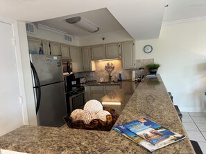 Private kitchen - Cozy 2-bedroom condo in wonderful Miramar Beach with Beach Service Hot Tub Pool (Miramar Beach)