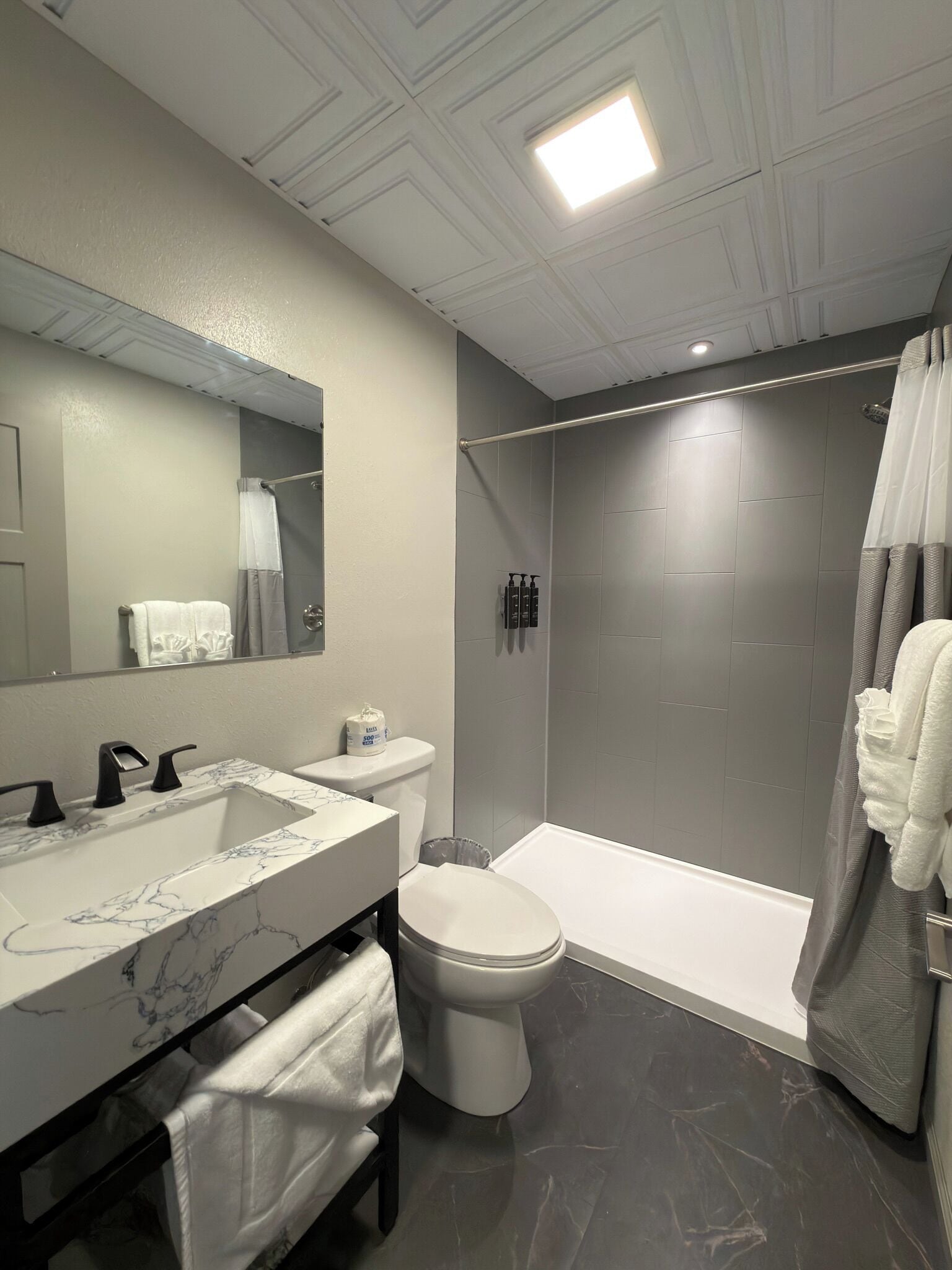 Hair dryer, towels, soap, shampoo